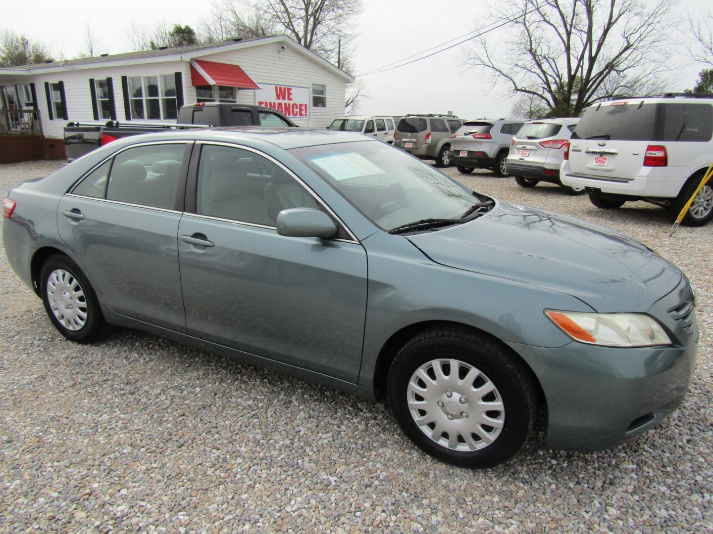 2009 Lt Green /Tan Toyota Camry (4T1BE46K19U) with an 4 Cyl engine, Automatic transmission, located at 15016 S Hwy 231, Midland City, AL, 36350, (334) 983-3001, 31.306210, -85.495277 - Photo#0